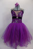 Magenta purple embroidered & sequin lace romantic tutu has skirt with crystal tulle overlay on purple/fuchsia mesh. Skirt has large purple flower at back. Front
