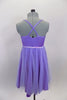 Lavender dress has sequin accented bust & waist with crystaled front, rose brooch accent & cross back straps. Skirt has white sheer on lavender lycra fro flow. Comes with rose hair accessory. Back