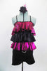 Black & fuchsia short unitard has 3-layered ruffled torso of pink/black zebra print,  black &  shiny fuchsia The ruffles and straps are covered with crystals to match belt buckle. Front