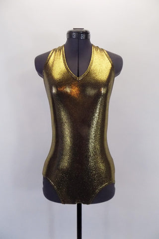 Metallic lined gold halter body suit is simple yet makes a statement. Front