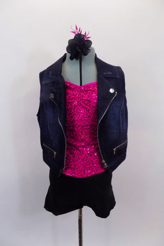 Short unitard has hot pink sequined camisole bodice and black shorts. The costume comes with a denim vest and hair accessory, Front