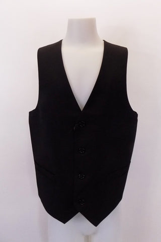 New with tags, black, four-button, “INC” slim-tapered vest has faux, square flap pocket accents at front. The black satiny back has an adjustable waist buckle. Front