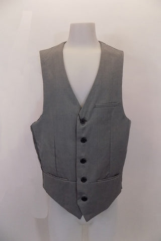 Grey textured five-button, “Urban” vest has darted side seams, faux slit pockets and breast pocket accents at front. The grey satiny back has adjustable buttons. Front