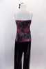 Faux patent leather front pleated pants have front pockets, belt loops & velcro closure. The accompanying top is a smoky black & red crinkle floral stretch. Back