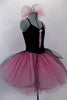 Black velvet camisole leotard dress with pink satin roses has an attached romantic tutu skirt in layers of pink nylon mesh with black tulle overlay. Comes with hair bun ruffle. Side
