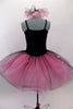 Black velvet camisole leotard dress with pink satin roses has an attached romantic tutu skirt in layers of pink nylon mesh with black tulle overlay. Comes with hair bun ruffle. Back