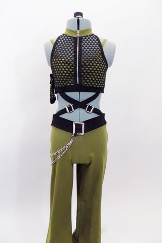 Khaki pants have a black waistband with large metal buckle & silver dangling hip chain. Matching half-top has large hole mesh, black halter collar overlay. Front