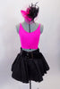 Pink racer-back top has crystalled neckline & pink short jacket. The matching black taffeta skirt has tulle petticoat Comes with large pink & black hair accessory & patent belt.  Front view without jacket