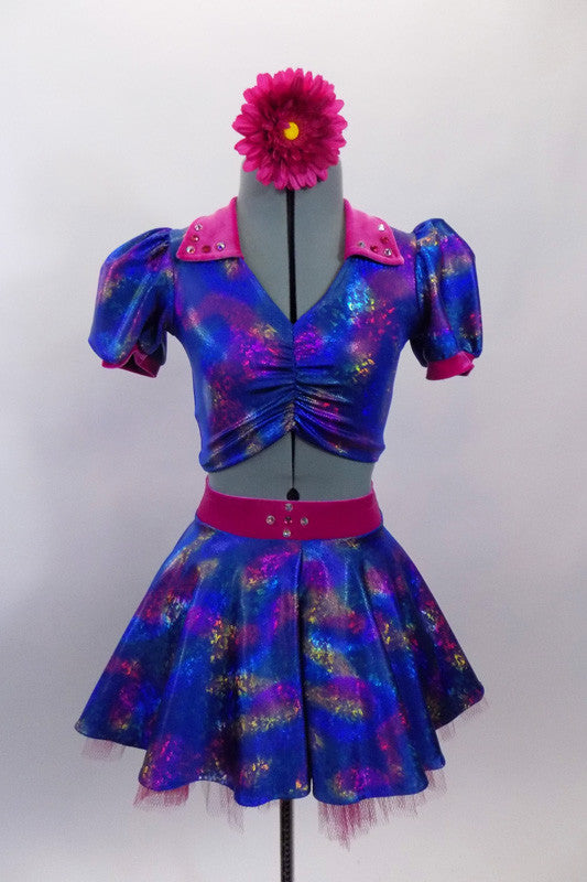 Blue base, 3-piece costume has pinks & golds throughout. Pouf sleeved half top has hot pink, crystalled velvet collar & matching skirt. Has pink floral hair accessory. Front 