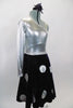 Silver metallic one shoulder long sleeve leotard is accompanied by navy blue velvet skirt with large crystalled silver buttons. Skirt has ruffled petticoat. Comes with hair accessory. Right side