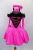 Pink & black halter-neck dress has crystal covered black mesh upper on pink dot dress with off-shoulder long sleeves. Black V front has pink lacing & black marabou fur trim. Comes with matching headband and large bow at back. Includes separate black velvet coat. Front without coat