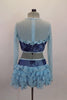 Pale blue long sleeved mesh half-top scattered with crystals, has ruffled bust area with dark blue sequin lace overlay. It is attached to ruffled chiffon skirt. Comes with blue floral hair accessory. Back