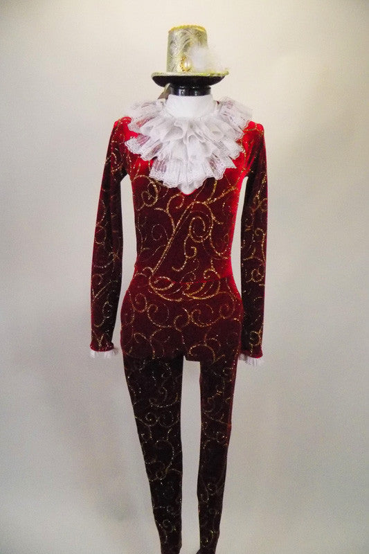 Deep red unitard had gold swirl accents, zip back and mandarin collar. There is an attached white ruffled lace bib-style ascot. Comes with top-hat headband. Front