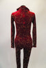 Deep red unitard had gold swirl accents, zip back and mandarin collar. There is an attached white ruffled lace bib-style ascot. Comes with top-hat headband. Back