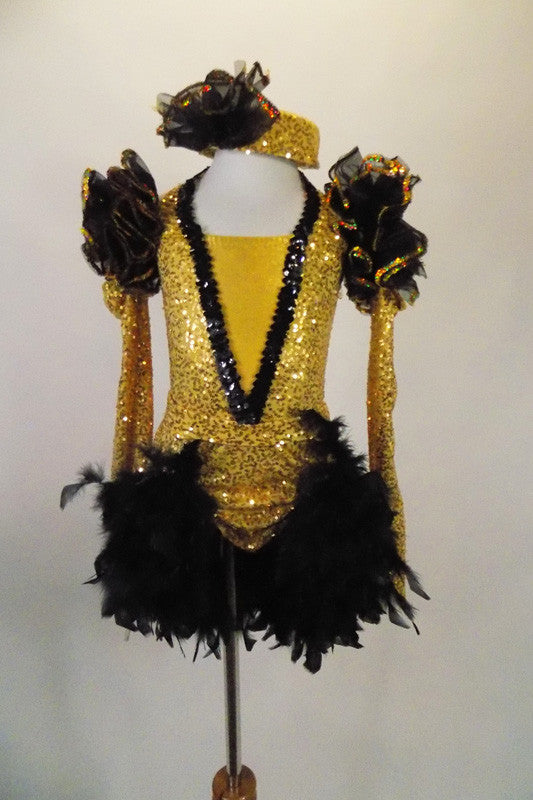  4-piece costume consists of a gold camisole leotard with black sequined front & matching skirt with boa feathers. Comes with pill hat and ruffled gauntlets. Front