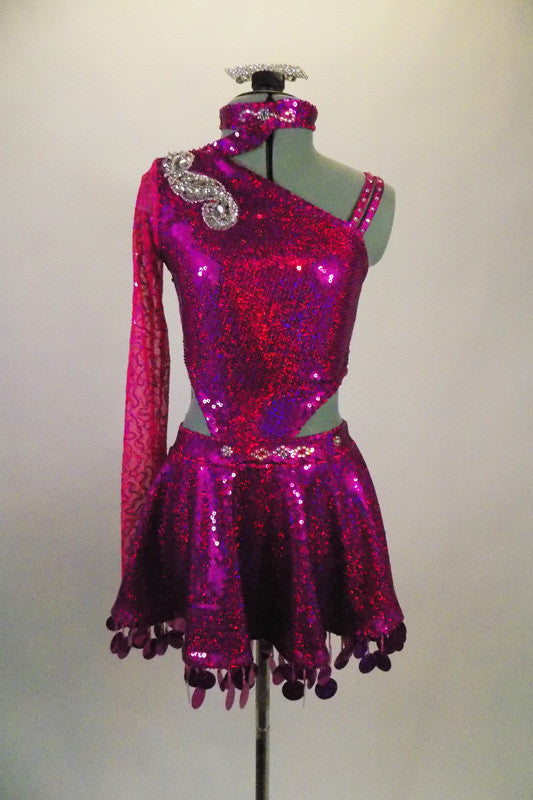 Fuchsia one sleeved costume has cut-out sides that attach at right hip. Back has angled straps, & sequined shoulder applique. Skirt has large dangling sequins. Comes with crystal hair barrette. Front