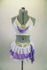 White bra has beaded lace with white chiffon & is embellished with crystal brooch accent. Skirts has purple & white chiffon ruffles & large beaded appliques. Comes with crystal hair comb. Front