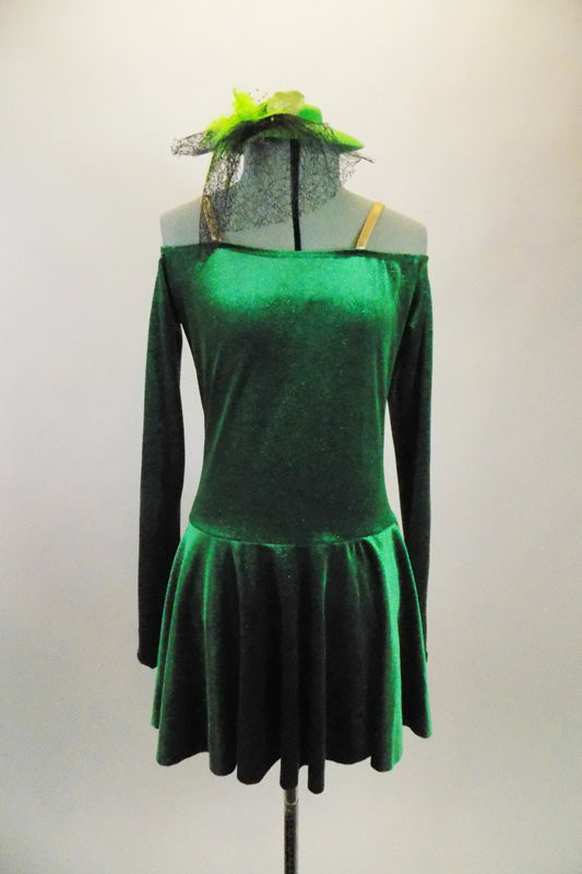 Simply Irish, green velvet off-shoulder dress ling sleeved dress has nude shoulder straps for support. Comes with green veiled hat accessory. Front