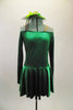 Simply Irish, green velvet off-shoulder dress ling sleeved dress has nude shoulder straps for support. Comes with green veiled hat accessory. Front