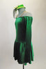 Simply Irish, green velvet off-shoulder dress ling sleeved dress has nude shoulder straps for support. Comes with green veiled hat accessory. Left side