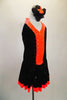 Black & bright orange halter dress has crystal covered orange front center & skirt ruffle. The back is open & ties at both center & neck. Comes with hair accessory. Right side