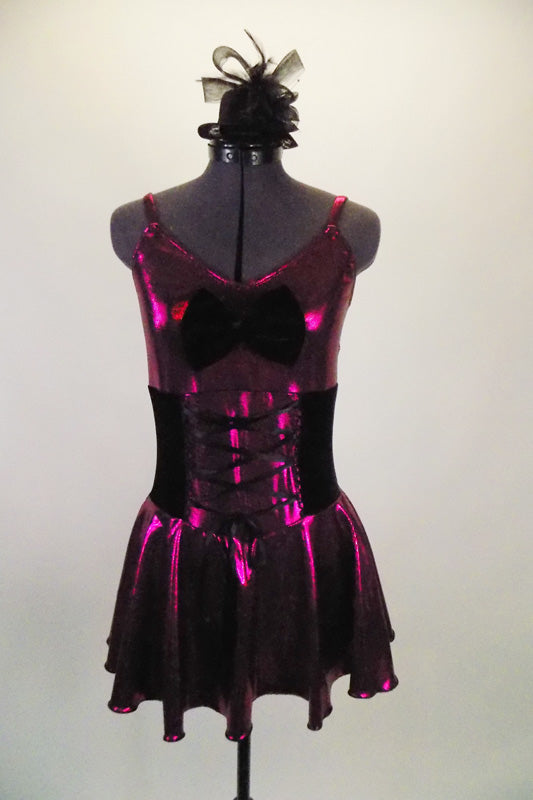Fuchsia metallic camisole dress has full skirt with brief. Front is embellished with black velvet bow. Has black velvet corset belt & mini top-hat accessory. Front