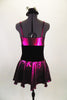 Fuchsia metallic camisole dress has full skirt with brief. Front is embellished with black velvet bow. Has black velvet corset belt & mini top-hat accessory. Back