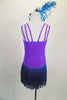 Iridescent purple-blue leotard has layered teal fringe skirt. Bodice is covered in crystals as are the triple shoulder straps. Comes with feather hair accessory. Back