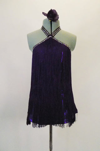 Deep purple halter fringe dress has neckline and low back lined with AB Swarovski crystals. The halter neck band has a double band of crystals for added bling. Comes with hair accessory