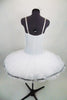 Professional pancake tutu has all white pleated tutu with silver sequin edging. White stretch bodice has silver  print with deep plunge bodice & crystal straps. Comes with hair accessory. Back