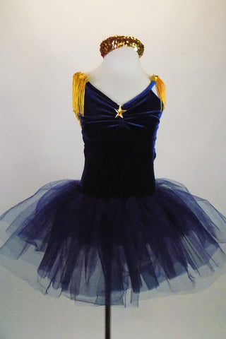 Navy blue velvet ballet dress has tulle tutu, pinch front with gold star and shoulders with tasseled epaulets. Comes with gold sequined headband. Front