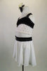 Black & white two-piece costume has crystal covered half top of white & black velvet comes with white chiffon shirt that a has black velvet crystalled belt. Left side