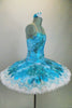 Professional hooped & tacked platter tutu has floral overlay in shades of turquoise. Tutu is edged with wide pearled bridal lace. Comes with hair accessory. Side
