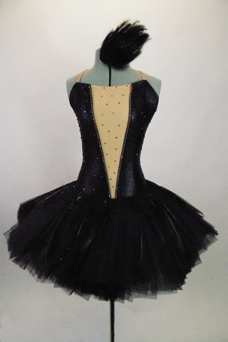 Professional Englishtutu adorned with black feathers has attached black low back bodice with nude center panel lined by crystals & scattered crystals throughout. Comes with feather hair accessory. Front
