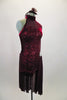 Deep maroon sequined unitard has velvet left side, leg cuffs, & neck. Sweetheart crossover neckline has sheer upper & sleeve. Has chiffon side skirt & applique. Comes with hair band accessory. Right side