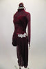 Deep maroon sequined unitard has velvet left side, leg cuffs, & neck. Sweetheart crossover neckline has sheer upper & sleeve. Has chiffon side skirt & applique. Comes with hair band accessory. Left side