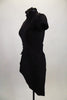 Black unitard has sarong skirt & large keyhole open back. Front is closed with high neck & cap sleeves. Comes with black appliques at back, shoulder & hips and applique hair accessory. Left side