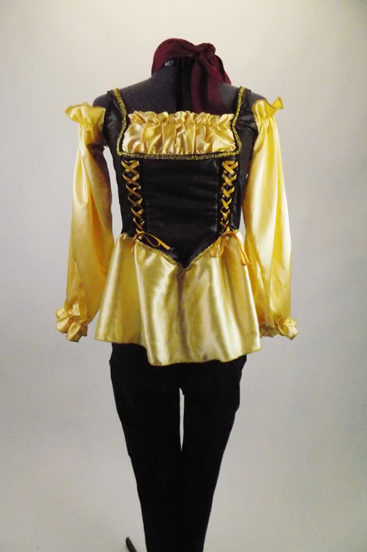 Wench girl themed costume has gold satin blouse with side-laced corset vest & blouson sleeves. Blouse is accompanied by black leggings &  burgundy hair band. Front