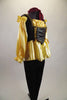 Wench girl themed costume has gold satin blouse with side-laced corset vest & blouson sleeves. Blouse is accompanied by black leggings &  burgundy hair band. Side