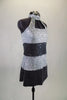 Sequined tunic dress has wide stripes of silver and charcoal with high neck open chest halter style cut. comes with matching hair accessory. Side