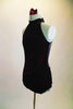 Black velvet leotard is full coverage front with high halter neck. Back is black sheer mesh with asymmetrical cut. Torso has red slash marks below the velvet. Comes with hair accessory. Side