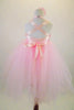 Romantic tutu dress in pale pink lace has layers of soft tulle attached to sequined bodice. Wide pink satin ribbon from shoulders cross & lace up at back.  Comes with hair flower, Back