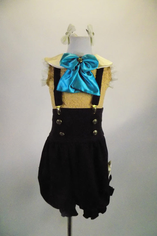 Brown velvet bloomer style shorts have high waist with brass button accents, ivory side bows & suspenders. The leotard is coffee lace with collar & bow ascot. Comes with ivory hair bows. Front