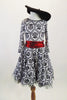 French flare, black and white damask motif, scoop neck dress has tulle crinoline and bright red tie belt. Comes with black felt beret hat. Front