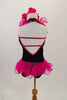 Black velvet short unitard has halter neck, deep open front & back, with hot pink organza curly ruffle trim and bustle. Comes with matching bandeau bra & flower. Back