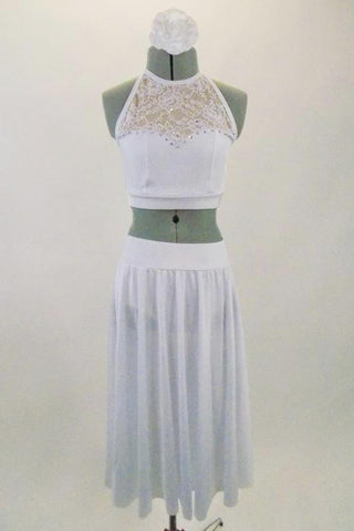 White, 2-piece costume comes with halter-neck half top with crystaled sweetheart neck & lace upper with keyhole back. Skirt has brief with calf length chiffon. Comes with floral hair accessory. Front