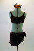 Brown three-piece costume has textured stone-like ruffling. Below the hip shrug is black briefs. Comes matching hair accessory. Front