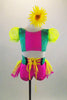 2-piece pink & green costume has bright yellow polka dot layered back bustle & pouf sleeves. Waistband has bright yellow lace up ribbon. Has daisy hair clip. Front