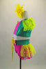 2-piece pink & green costume has bright yellow polka dot layered back bustle & pouf sleeves. Waistband has bright yellow lace up ribbon. Has daisy hair clip. Left side