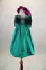 Green taffeta smocked back bubble dress has large crystaled bow accent that covers the bust & pink crystal accents. Comes with pink sequined beret & pink gloves. Front